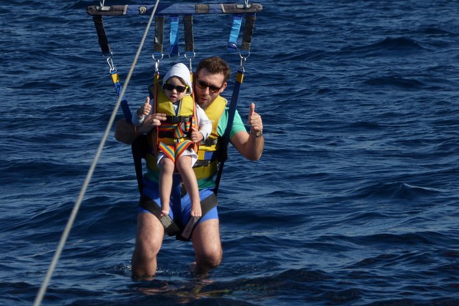 Parascending Tenerife. Stroll above the south Tenerife sea - What Happens on the Boat: Harness Up, Then Off