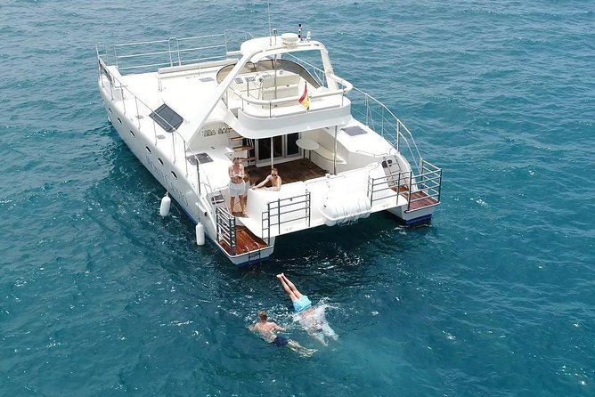 Private Catamaran Charter with Transfer, Buffet and Snorkeling - Lunch, Snacks, and Alcohol: Eating Like It’s Part of the Trip