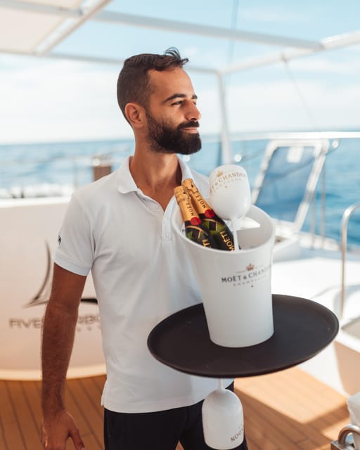 Tenerife: Catamaran Cruise with Brunch and Unlimited Drinks - Comfort on a catamaran: seating, beds, towels, and sea-sickness reality