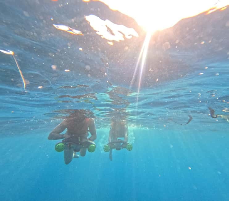 Tenerife: Kayak and Snorkeling Tour with Photos - Sea caves stop: the underwater-life bonus